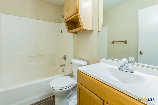 full bathroom with wood-type flooring, vanity, toilet, and shower / tub combination