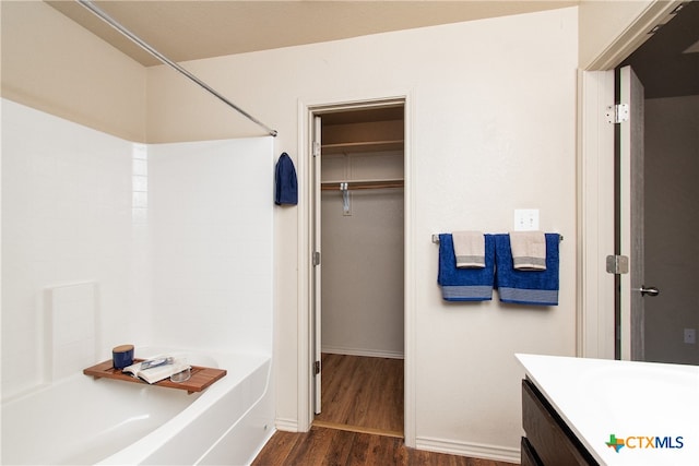 bathroom featuring vanity and wood-type flooring