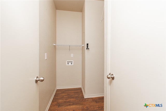 laundry room with dark wood-type flooring and washer hookup