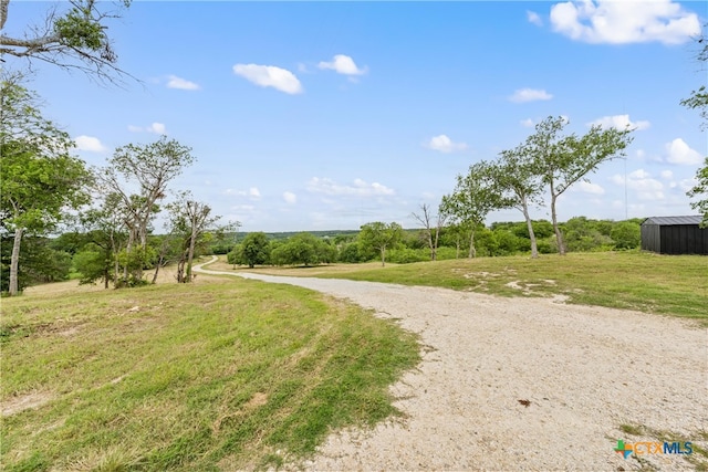 view of community featuring a lawn
