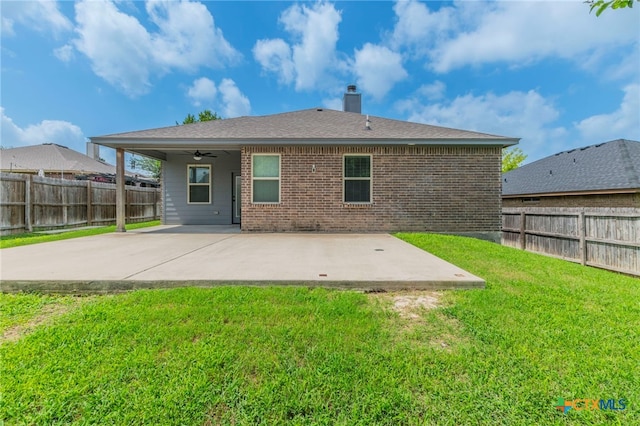 8530 Lamplight Ct, Temple, TX 76502 - rear view of house with ceiling fan, a patio area, a fenced backyard, and brick siding
