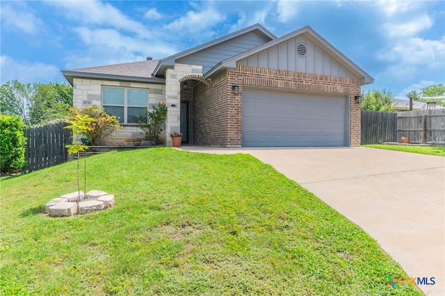 8530 Lamplight Ct, Temple, TX 76502 - single story home featuring brick siding, concrete driveway, an attached garage, and board and batten siding