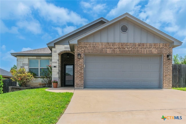 8530 Lamplight Ct, Temple, TX 76502 - ranch-style home featuring brick siding, concrete driveway, a garage, and board and batten siding