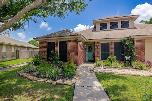 503 Ashland Crk, Victoria, TX 77901 - view of front of property with brick siding and a shingled roof