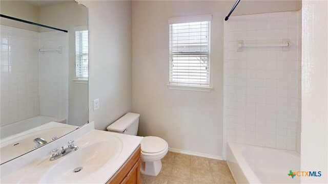 7016 Brandon Dr, Temple, TX 76502 - bathroom featuring vanity, tile patterned floors, and tub / shower combination