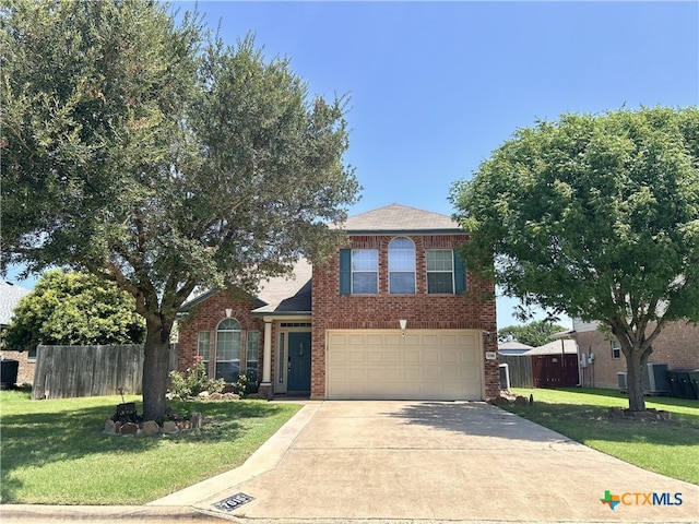 7016 Brandon Dr, Temple, TX 76502 - traditional-style home with brick siding, driveway, a garage, and a shingled roof