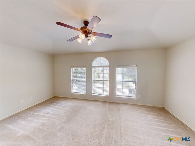 7016 Brandon Dr, Temple, TX 76502 - empty room with healthy amount of natural light, light colored carpet, and ceiling fan
