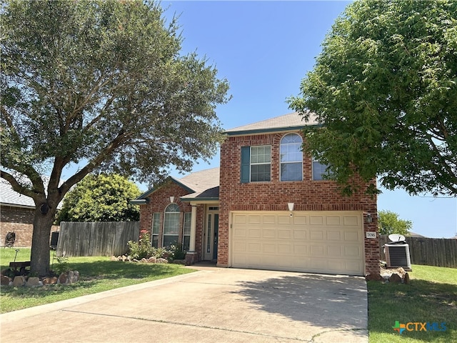 7016 Brandon Dr, Temple, TX 76502 - traditional home with brick siding, concrete driveway, a shingled roof, and an attached garage