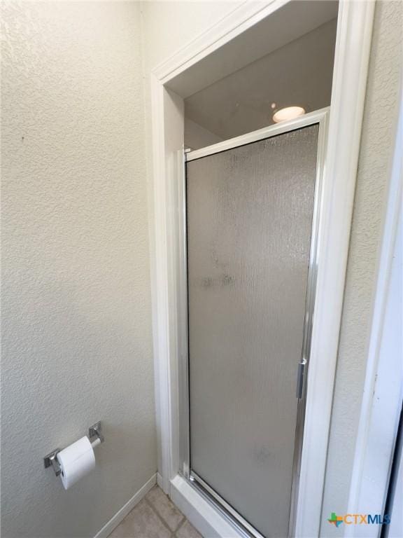12169 Oakalla Rd, Killeen, TX 76549 - bathroom featuring a shower stall and tile patterned flooring