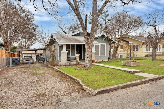 view of front of house with a front lawn and covered porch