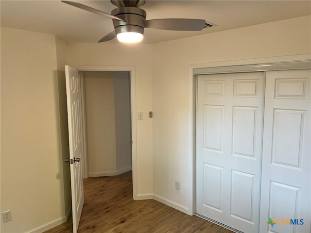 836 Mica Ln, Leander, TX 78641 - unfurnished bedroom featuring wood finished floors, baseboards, a closet, and ceiling fan