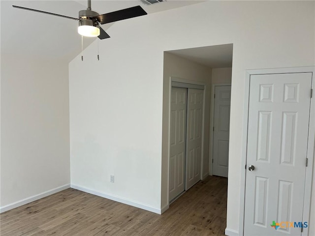 836 Mica Ln, Leander, TX 78641 - spare room featuring light wood-style flooring, baseboards, and a ceiling fan