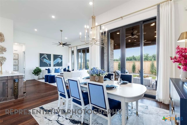 dining room with wood finished floors, plenty of natural light, a ceiling fan, and recessed lighting