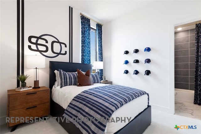 bedroom featuring marble finish floor