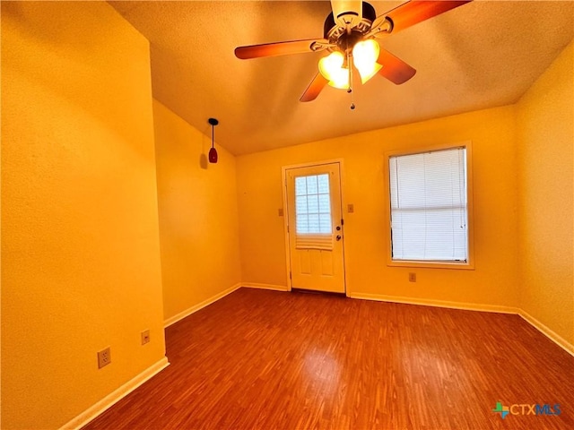 899/901 Hillyer St, San Marcos, TX 78666 - entrance foyer with wood finished floors, baseboards, and a ceiling fan