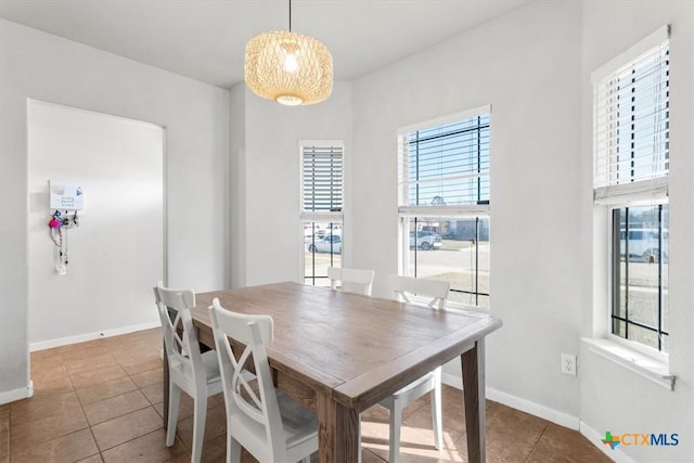 dining room featuring tile patterned flooring