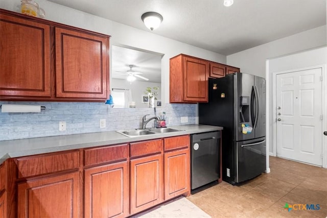 kitchen with ceiling fan, sink, appliances with stainless steel finishes, and tasteful backsplash