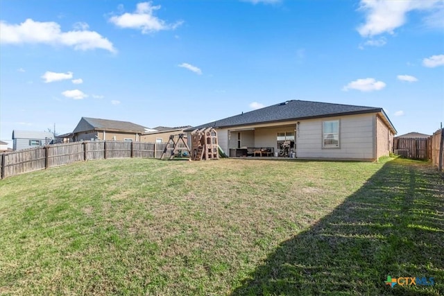 view of yard with a playground