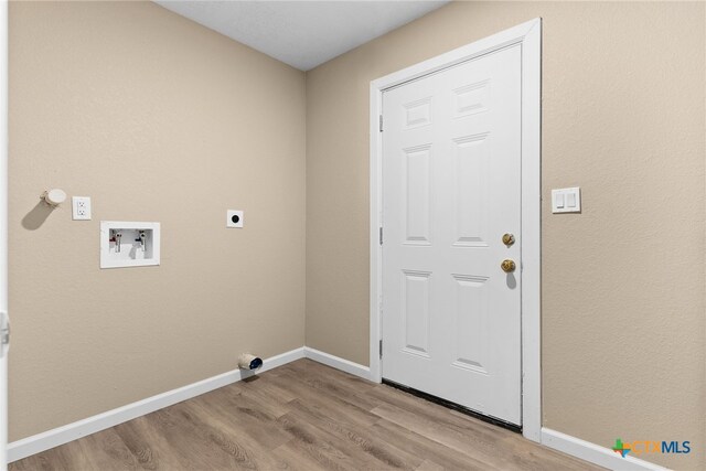 laundry room with washer hookup, electric dryer hookup, and light hardwood / wood-style floors