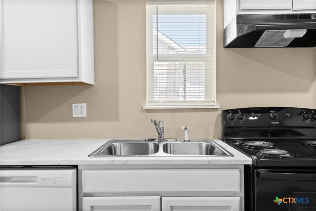 kitchen with black range with electric cooktop, white dishwasher, sink, white cabinets, and range hood