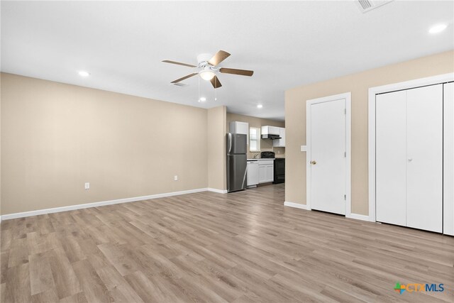 unfurnished living room with light hardwood / wood-style floors and ceiling fan