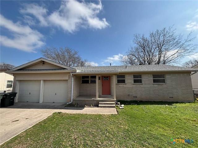 single story home featuring a garage and a front lawn