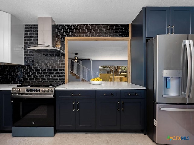 187 Meadow Ave, New Braunfels, TX 78130 - kitchen featuring stainless steel appliances, backsplash, light tile patterned flooring, wall chimney range hood, and a ceiling fan