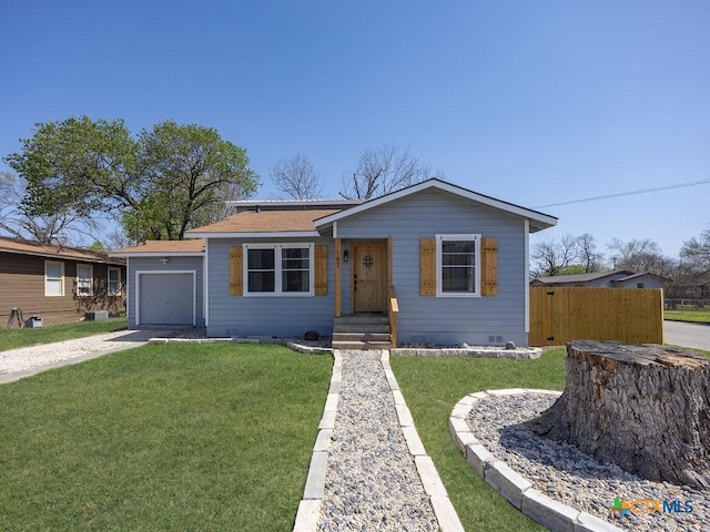 187 Meadow Ave, New Braunfels, TX 78130 - view of front of home with fence, a garage, concrete driveway, crawl space, and a front lawn