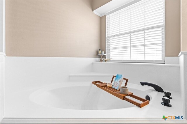 interior details featuring a garden tub