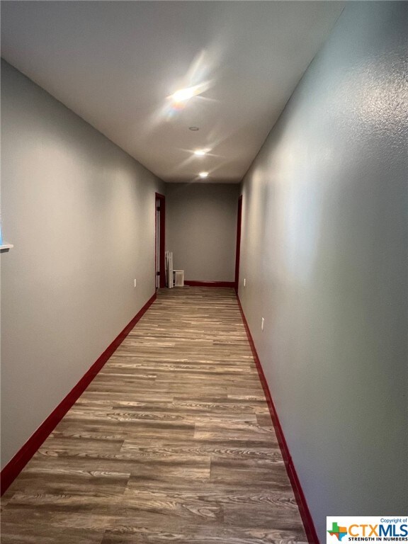 hall featuring hardwood / wood-style flooring