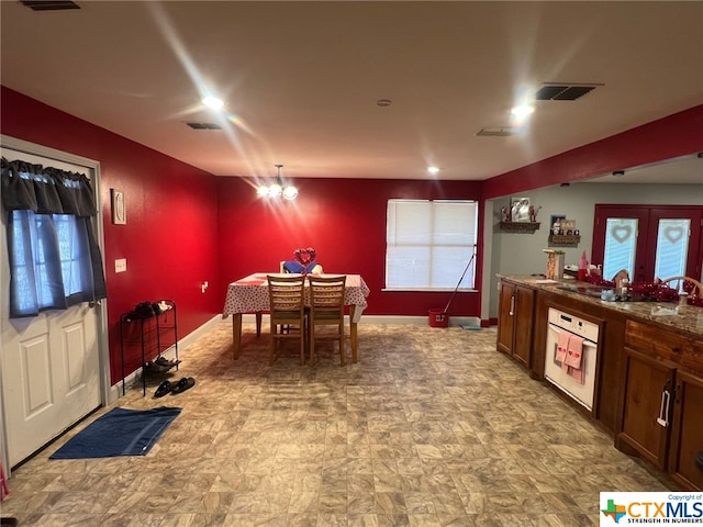 dining space featuring french doors