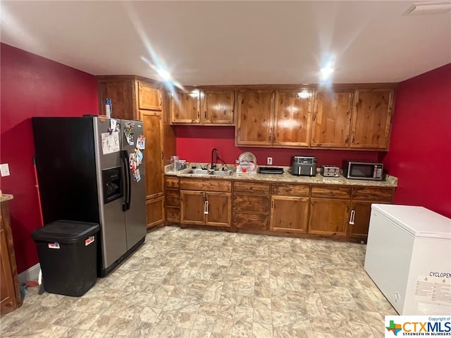 kitchen with stainless steel appliances and sink