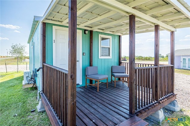 143 S Quailrun Ave, Port Lavaca, TX 77979 - deck with a yard