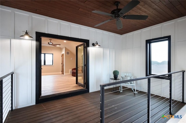 wooden terrace with ceiling fan