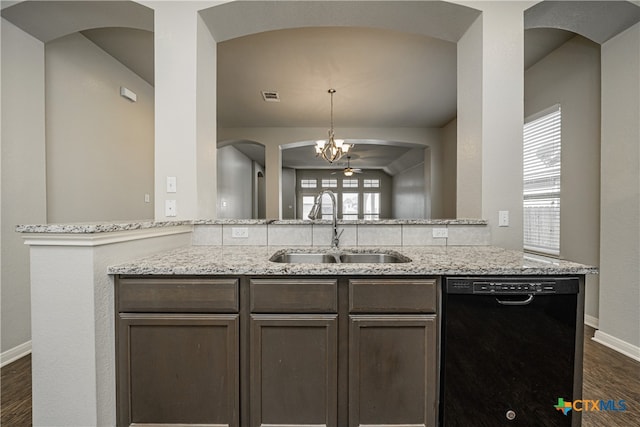 kitchen featuring dishwasher, decorative light fixtures, a wealth of natural light, and sink