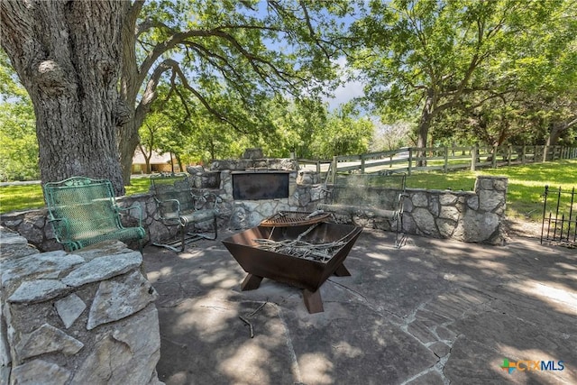 2662 Edgegrove, Canyon Lake, TX 78133 - view of patio / terrace with an outdoor fire pit