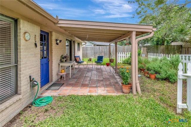 112 Laramie Dr, Victoria, TX 77904 - fenced backyard featuring a patio