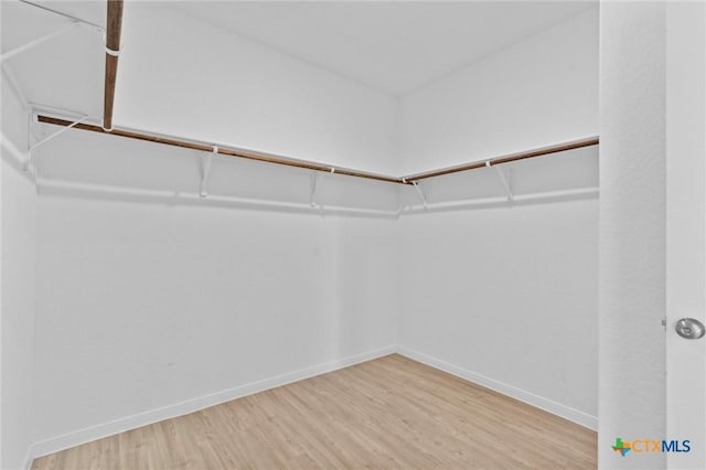 9063 Rancher Trl, Seguin, TX 78155 - spacious closet featuring wood finished floors