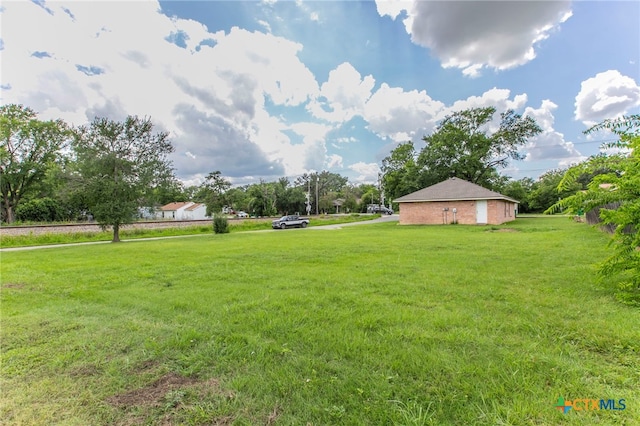 1012 N Beal St, Belton, TX 76513 - view of grassy yard featuring view of scattered trees