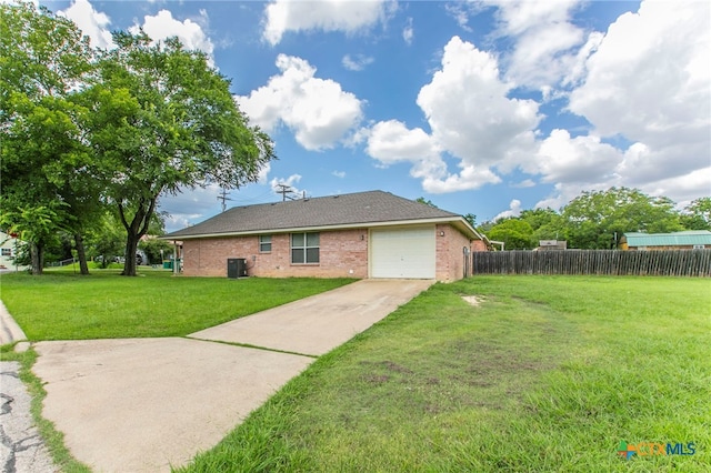 1012 N Beal St, Belton, TX 76513 - back of property with brick siding, concrete driveway, and a garage