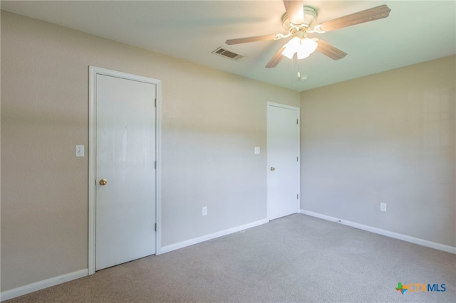 1012 N Beal St, Belton, TX 76513 - carpeted empty room featuring a ceiling fan and baseboards