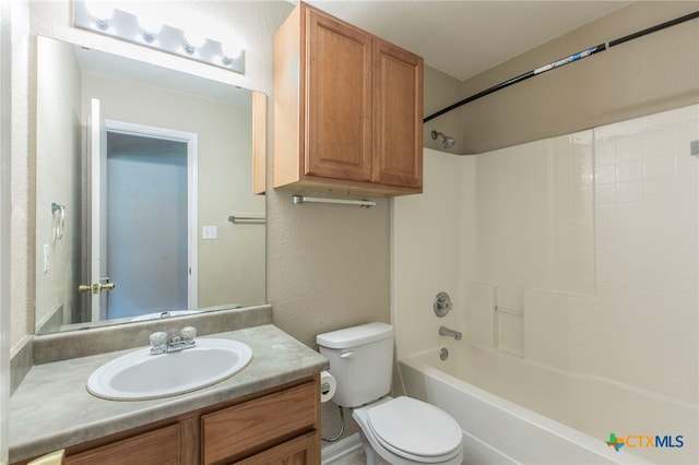 1012 N Beal St, Belton, TX 76513 - bathroom with vanity, bathtub / shower combination, and a textured wall