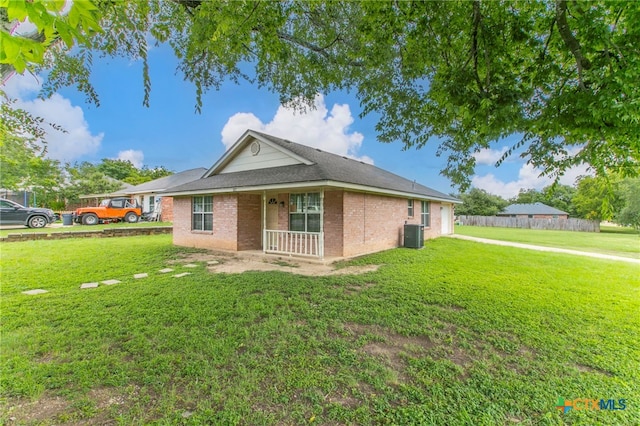 1012 N Beal St, Belton, TX 76513 - view of front facade with brick siding and covered porch
