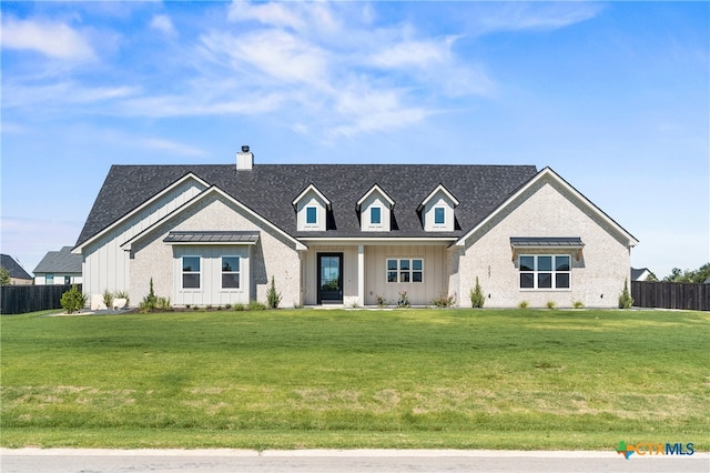 view of front of house with a front lawn