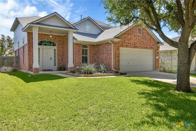 3405 Campanella Dr, Round Rock, TX 78665 - view of front of house with brick siding, a garage, driveway, and roof with shingles
