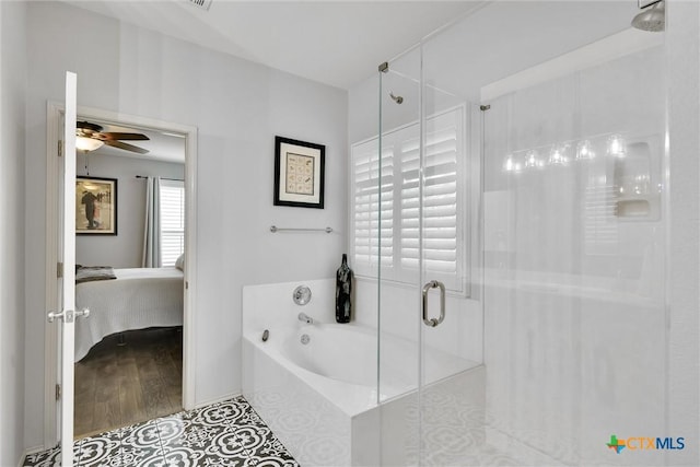 3405 Campanella Dr, Round Rock, TX 78665 - ensuite bathroom featuring a stall shower, a garden tub, ceiling fan, and tile patterned flooring