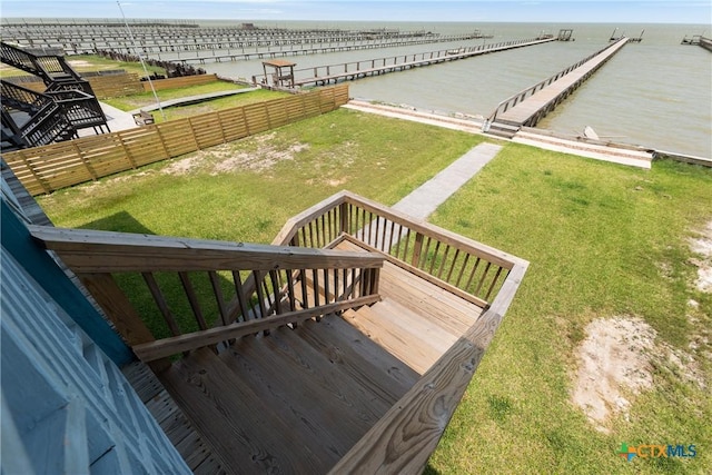 616 N Shore Dr, Port Mansfield, TX 78598 - deck with a water view and a yard