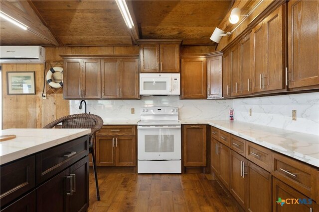 616 N Shore Dr, Port Mansfield, TX 78598 - kitchen with white appliances, an AC wall unit, wood ceiling, dark wood finished floors, and tasteful backsplash