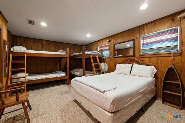 616 N Shore Dr, Port Mansfield, TX 78598 - bedroom featuring carpet floors, wooden walls, and recessed lighting