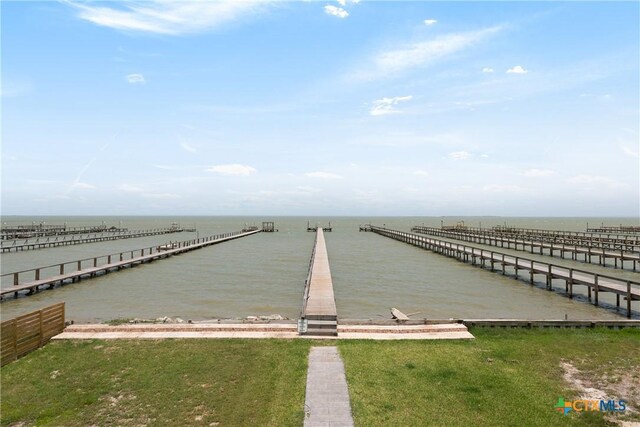 616 N Shore Dr, Port Mansfield, TX 78598 - dock featuring a water view and a pier